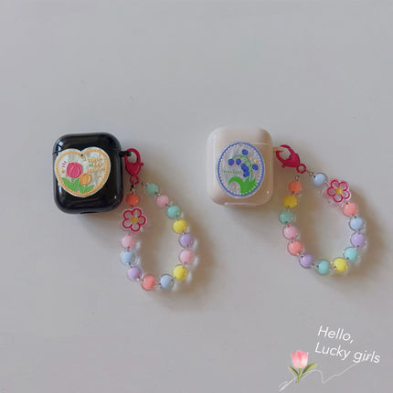 Floral Off-white AirPods Pro Case with Colorful Bracelet