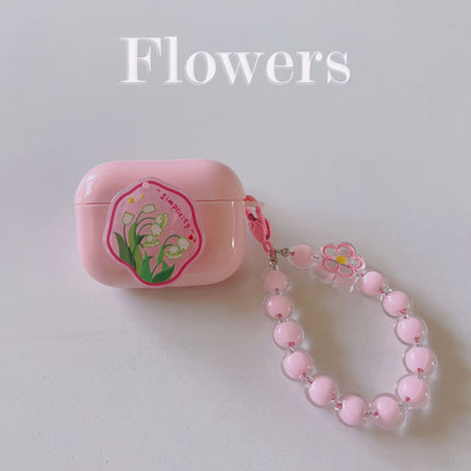 Floral patches + pink base shell + pink bracelet Apple AirPods 1/2