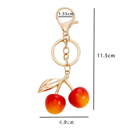 Mini refined pink cherry keychain with gold leaves, soft romantic touch elevates your daily matching style