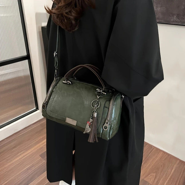 Vintage Tote Bag Spacious multi-pocket design with tassel and metal accents supports multiple carrying – product detail