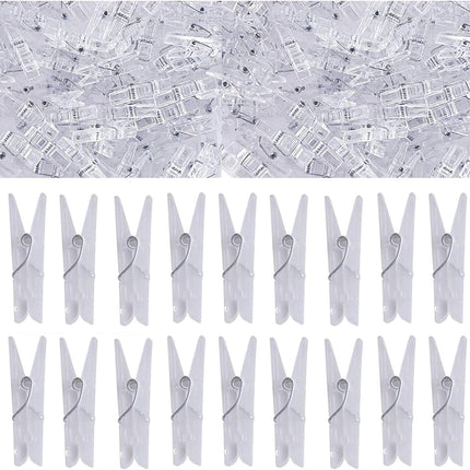 Yansanido 100pcs Mini Clear Plastic Utility Paper Clip, Clothespins Clips, Clothes Line String Clips, mini Clothes Pins for Photo for String Fairy Lights Color Clear(100pcs Clear Plastic Clips)