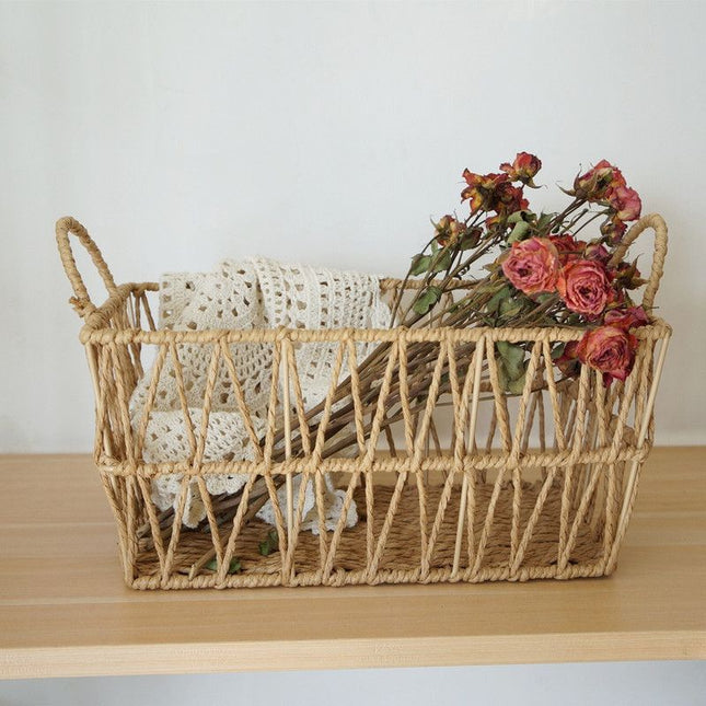 Handwoven paper rope storage basket with a rectangular design and two handles perfect for organizing