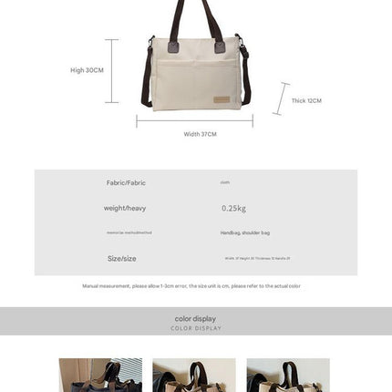 Stylish white canvas tote bag with detachable shoulder strap