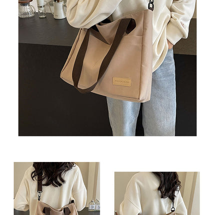 Stylish khaki canvas tote bag with detachable shoulder strap