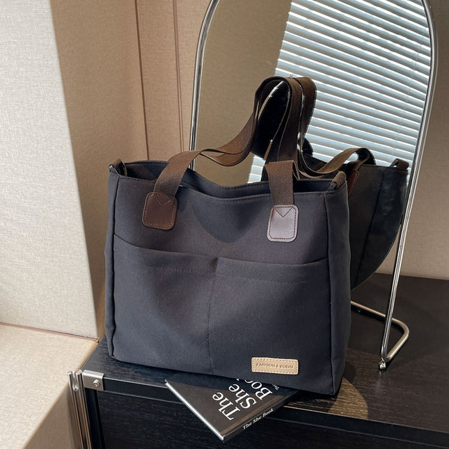 Stylish black canvas tote bag with detachable shoulder strap V888-ELOSUNG25003