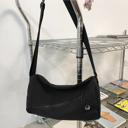 An elegant black shoulder bag for travel and work