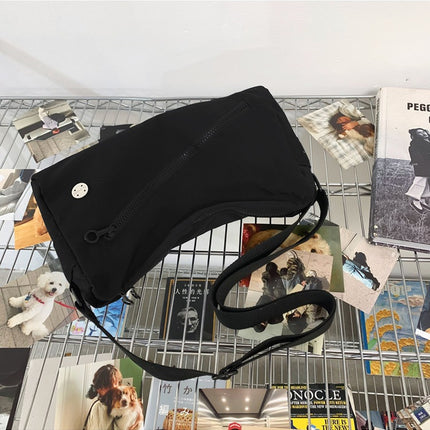 An elegant black shoulder bag for travel and work
