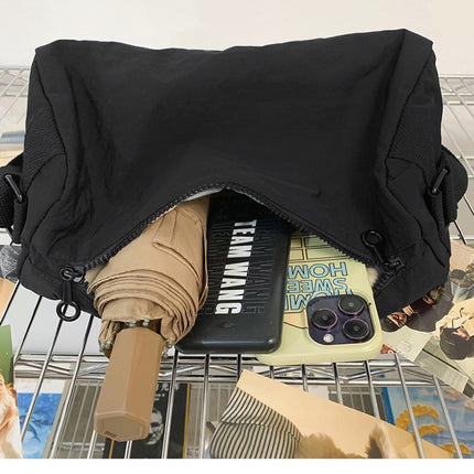 An elegant black shoulder bag for travel and work