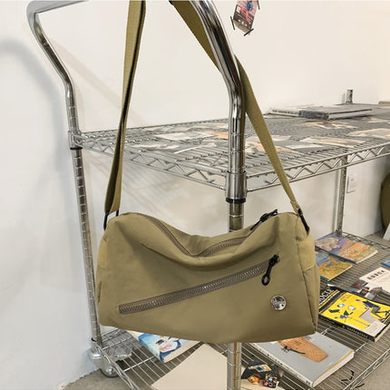 An elegant khaki shoulder bag for travel and work