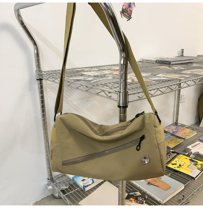 An elegant khaki shoulder bag for travel and work – product detail