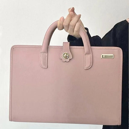 Stylish Leather Laptop Sleeve with Handle and Perforated Design - Soft Pink Color