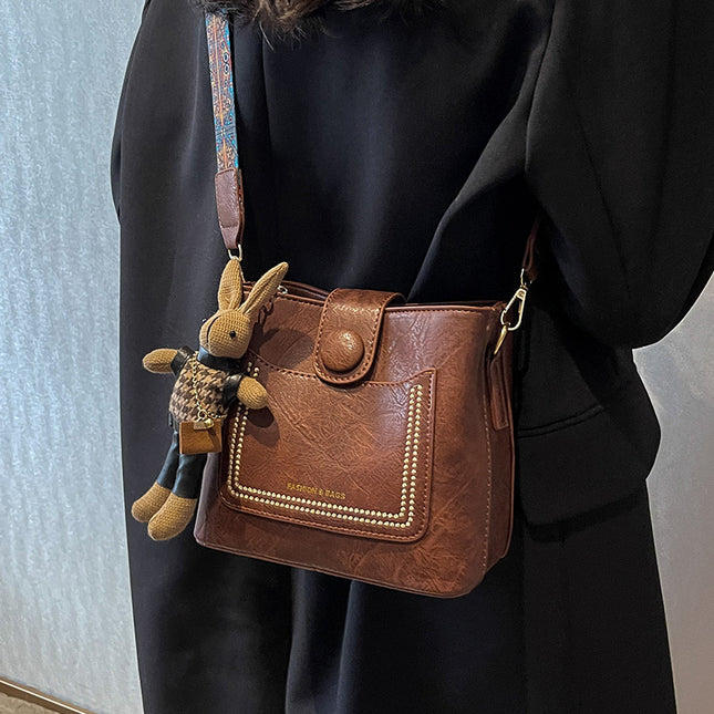 Vintage Style PU Leather Bucket Bag with Wide Patterned Strap & Optional Bunny Charm(caramel) – product detail