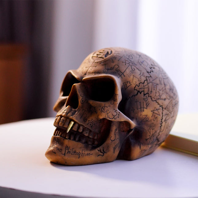 Mystic Runic Skull Statue with Gold Fang