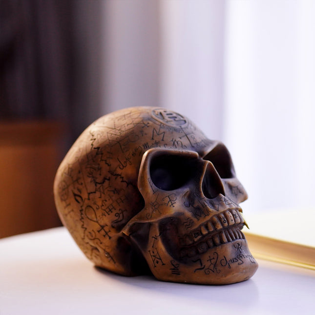Mystic Runic Skull Statue with Gold Fang – product detail