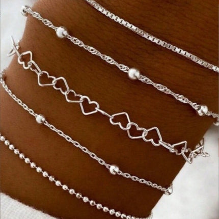 A golden five-piece set Chic Multi-Layered Alloy Bracelet Set - Fashionable Stackable Jewelry