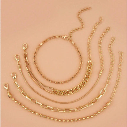 A golden five-piece set Chic Multi-Layered Alloy Bracelet Set - Fashionable Stackable Jewelry