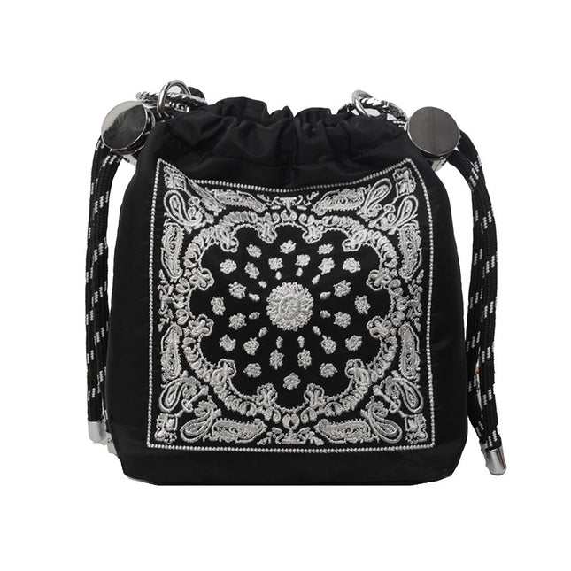 Chic Drawstring Bucket Bag with Intricate Print