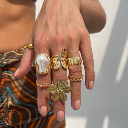 7-Piece Molten Gold Tone Ring Set - Baroque Faux Pearl, Flower, Chain Link & Abstract Shield Bands - Ultimate Adjustable Boho Stackable Jewellery