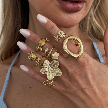 9-Piece Pale Gold Ocean-Inspired Stackable Ring Set - Metal Sea Turtle Starfish Floral Adjustable Open Finger Jewelry for Women