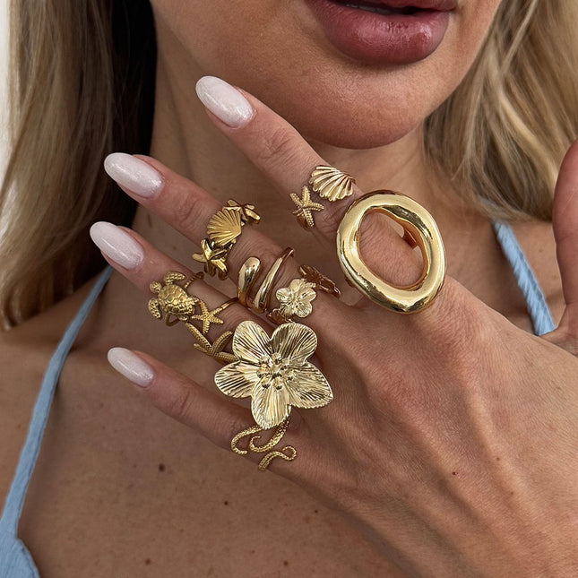 9-Piece Pale Gold Ocean-Inspired Stackable Ring Set – product detail