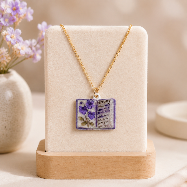 Vintage-style book necklace with February birthday flowers a luxurious gold-plated bronze exquisite floral