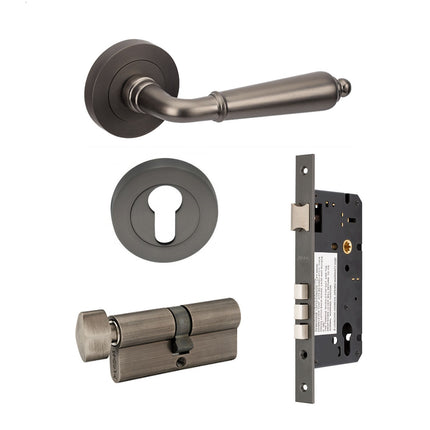 10074.4.GN | Oxford Door Lever Handle on Round Rose Entrance Set 70mm (Key/Turn) Graphite Nickel 100744.GN | Zanda Architectural