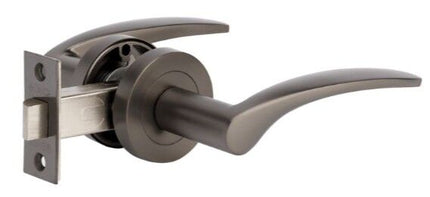 7033.GN | Apollo Door Handle Lever on Round Rose Passage Set Graphite Nickel | Zanda Architectural