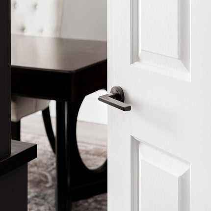 7196.GN | Vector Door Handle Lever on Round Rose Integrated Privacy Set Graphite Nickel | Zanda Architectural